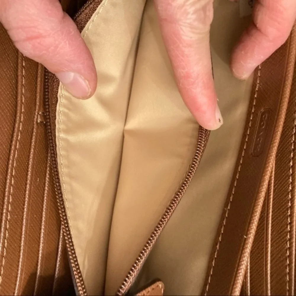 Coach brown embossed leather c wallet